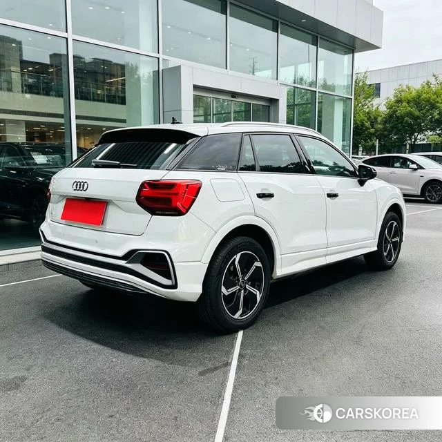 Audi Q2L 2022 Белый из Китая