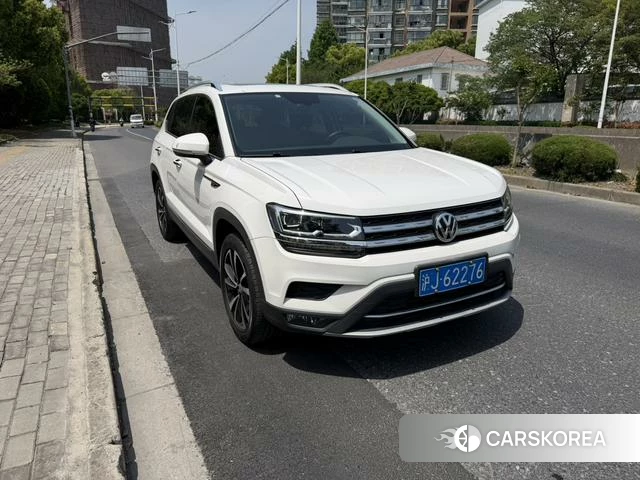 Volkswagen Tharu 2020 Белый из Китая