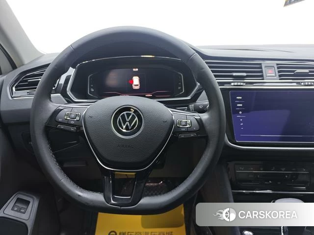 Volkswagen Tiguan L 2021 Белый из Китая, фото 2