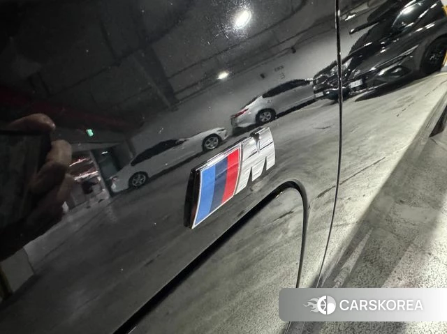 BMW 7 Series (G70) 2024 Черный из Кореи, фото 5