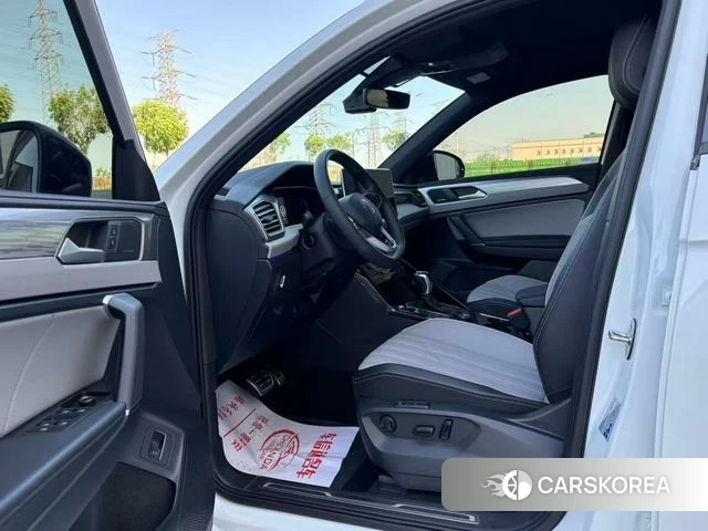 Volkswagen Tayron 2023 Белый из Китая, фото 3