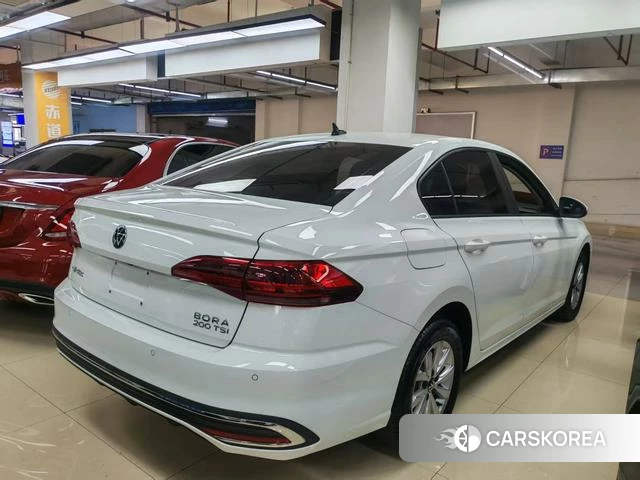 Volkswagen Bora 2024 Белый из Китая, фото 6