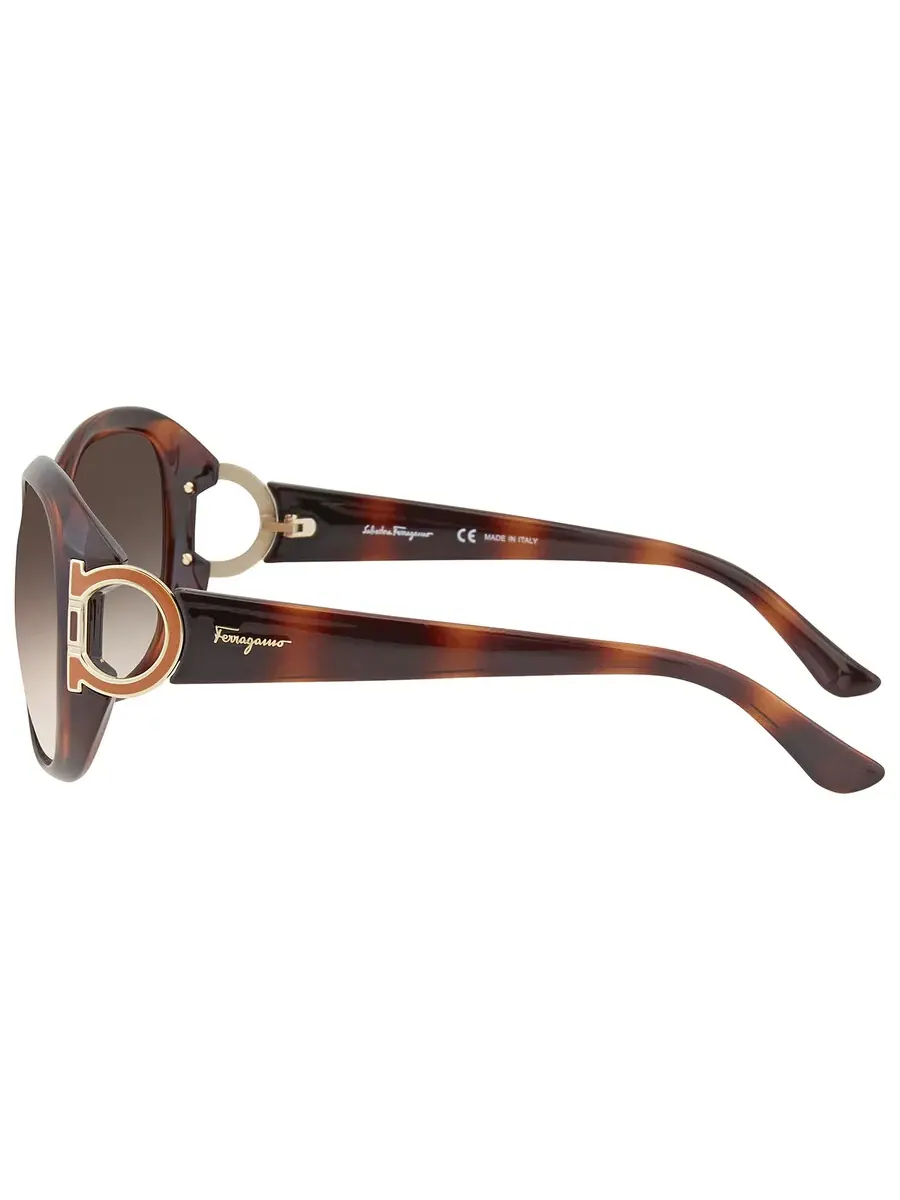 Женские солнцезащитные очки Salvatore Ferragamo овальные коричневого градиентного цвета SF668S 238 — изображение 4 из 4