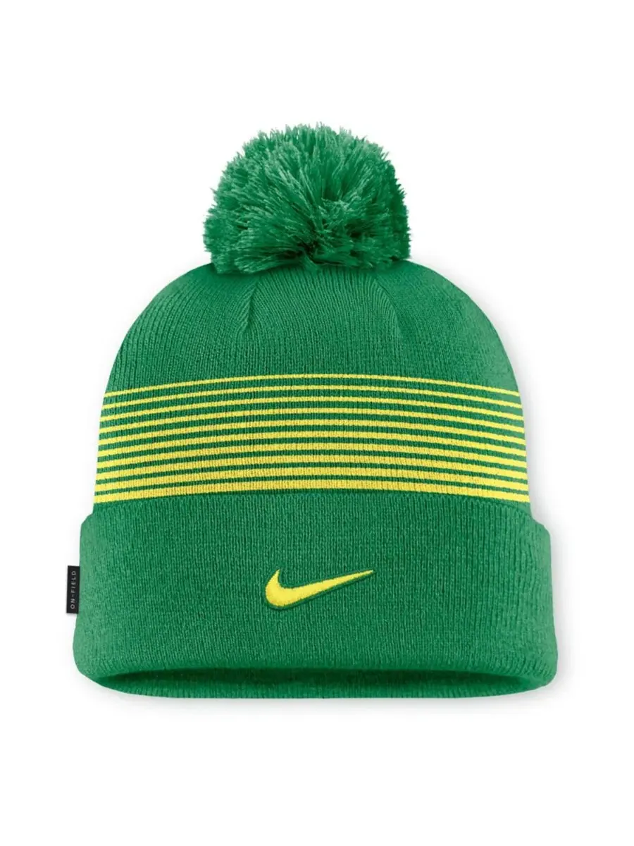 Шапка вязаная с помпоном Oregon Ducks 2026 On-Field Cuffed Knit Hat with Pom Nike — изображение 1 из 1, зеленый желтый