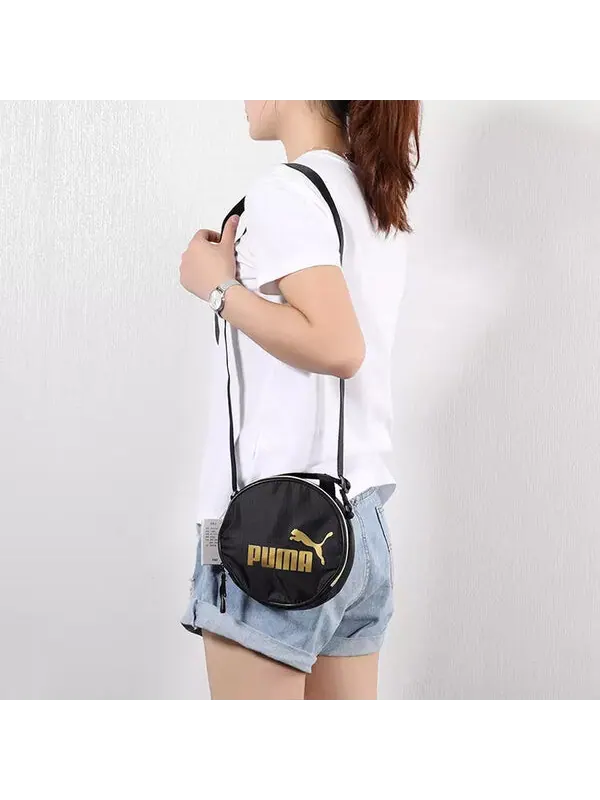 Сумка core seasonal round case bag 'black' Puma — изображение 4 из 4, черный/золотистый