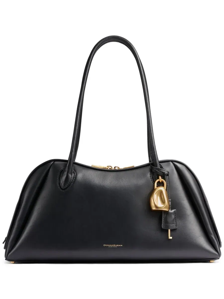 Большая кожаная сумка через плечо Terry Donna Karan New York — изображение 1 из 9, черный/золотистый