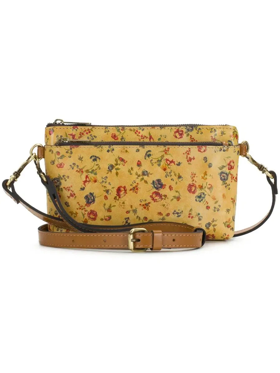 Кожаный клатч-кроссбоди Mignon Small Leather Wristlet Crossbody Handbag Patricia Nash — розовый