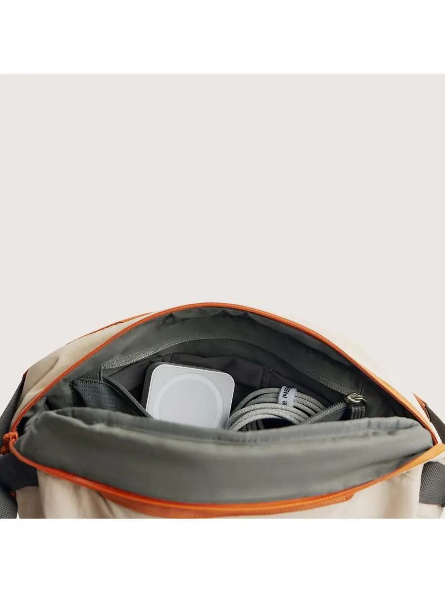 Сумка-слинг для фотоаппарата Soar 6 л с держателем для штатива, оранжевая BAGSMART — изображение 9 из 9, оранжевый