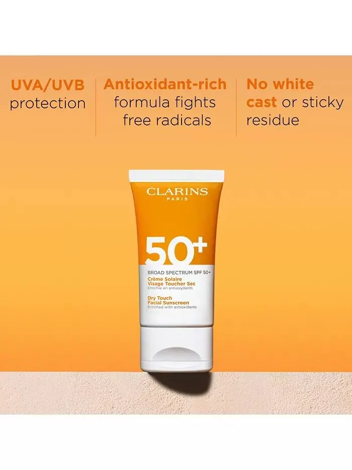 Солнцезащитный крем для лица Dry Touch широкого спектра SPF 50+, 1,7 унции Clarins — изображение 2 из 6