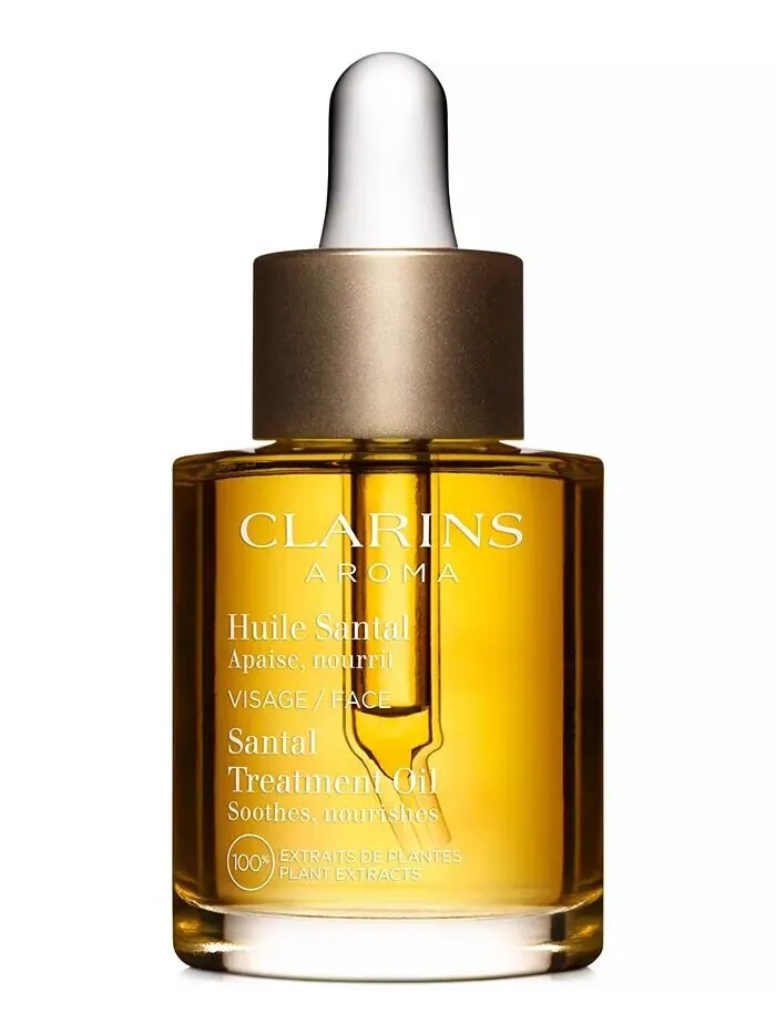 Крем для лица Clarins — Успокаивающее и увлажняющее масло для ухода за лицом Santal — изображение 1 из 6