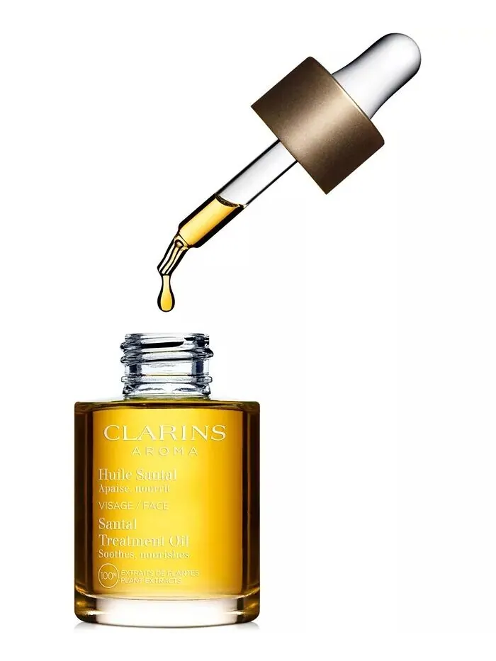 Крем для лица Clarins — Успокаивающее и увлажняющее масло для ухода за лицом Santal — изображение 5 из 6