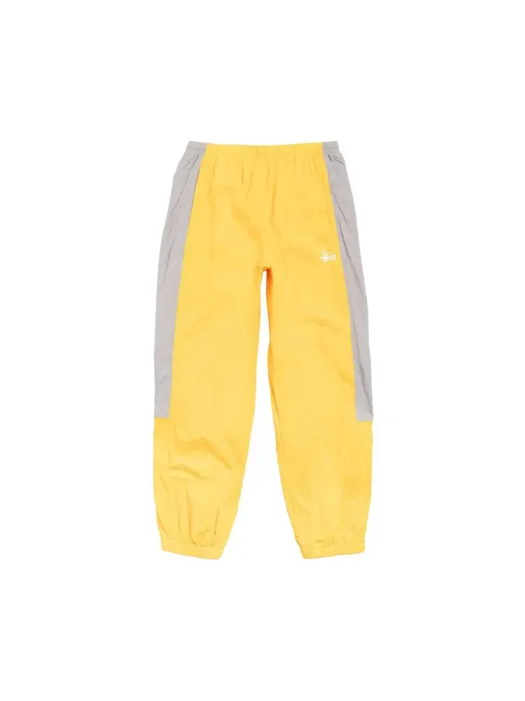 Спортивные брюки Stussy из нейлона — изображение 1 из 2, желтый