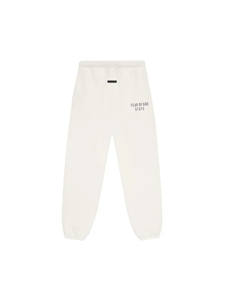 Спортивные брюки Fear of God Essentials Fleece Sweatpant Shell — изображение 1 из 2, кремовый