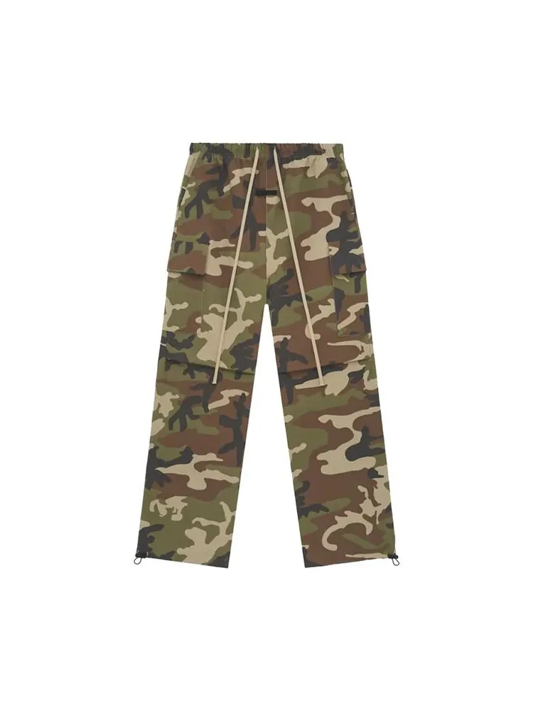 Брюки Fear of God Essentials Military Nylon Field Pant Woodland Camo — изображение 1 из 2, разноцветный