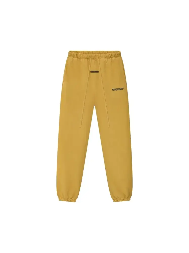 Спортивные штаны Fear of God Essentials Heavy Fleece Classic Sweatpant — изображение 1 из 3, желтый