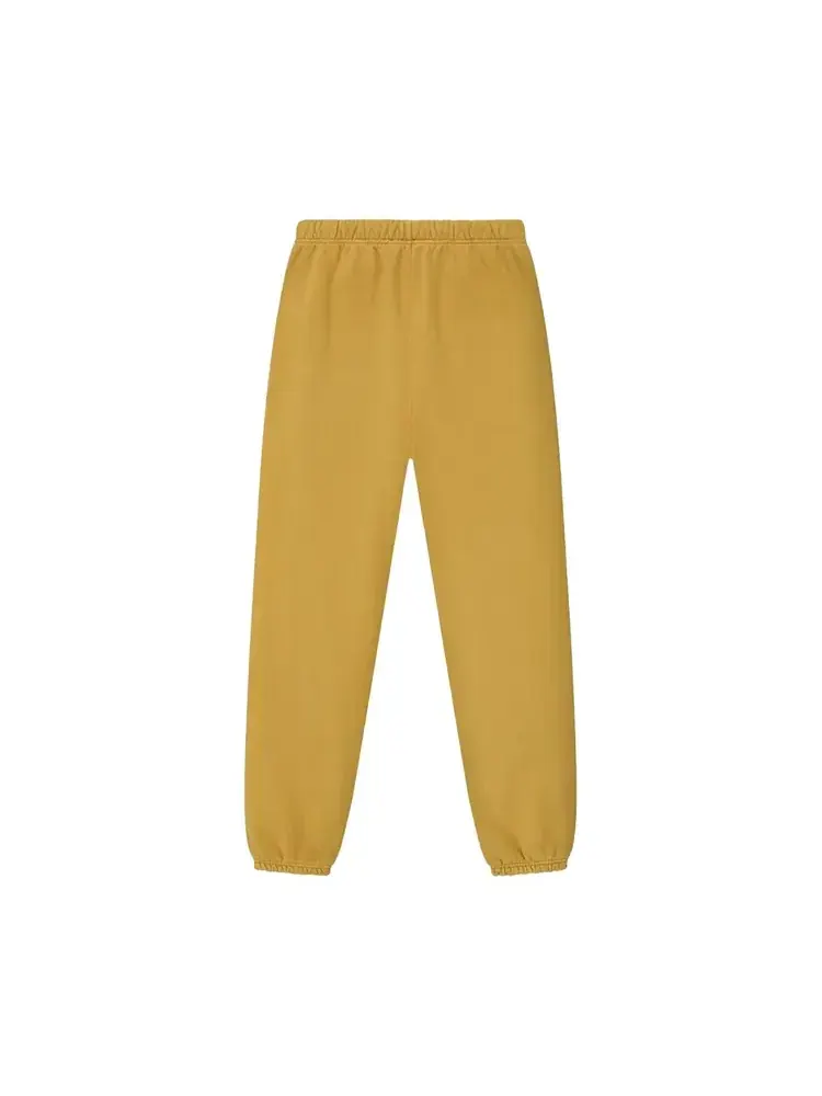Спортивные штаны Fear of God Essentials Heavy Fleece Classic Sweatpant — изображение 2 из 3, желтый