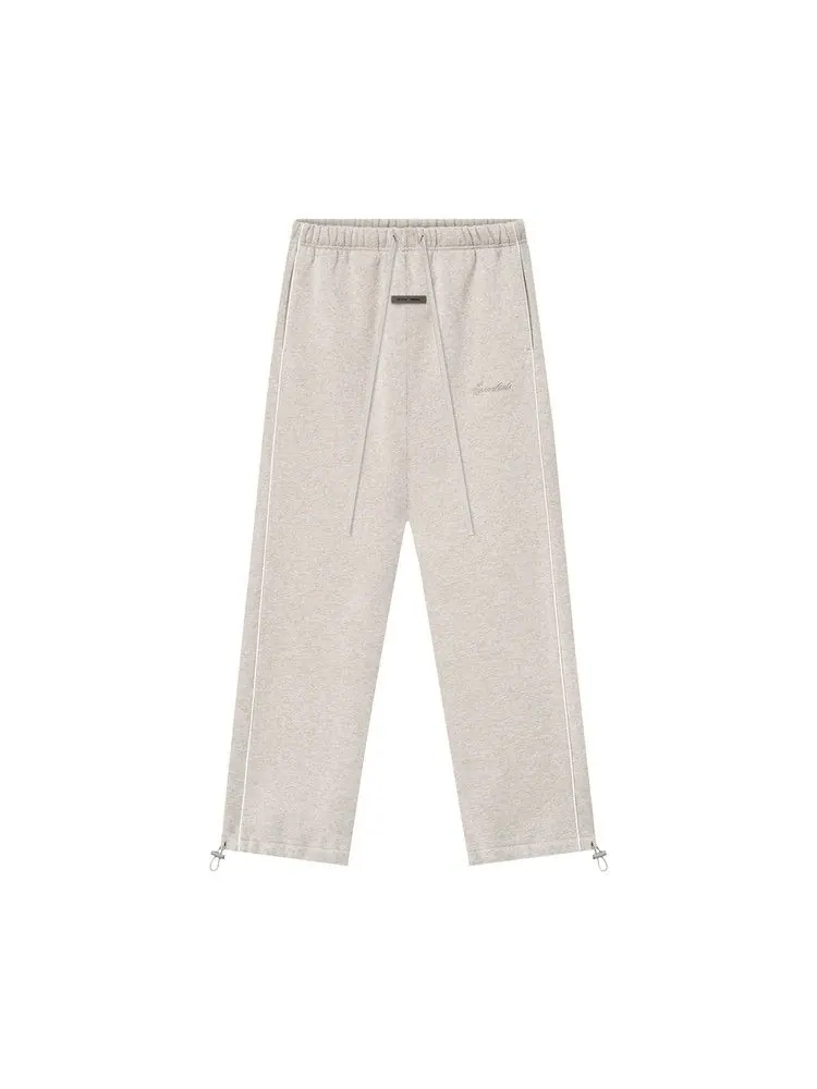 Спортивные брюки Fear of God Essentials Relaxed Fleece Sweatpant With Piping — изображение 1 из 2, белый