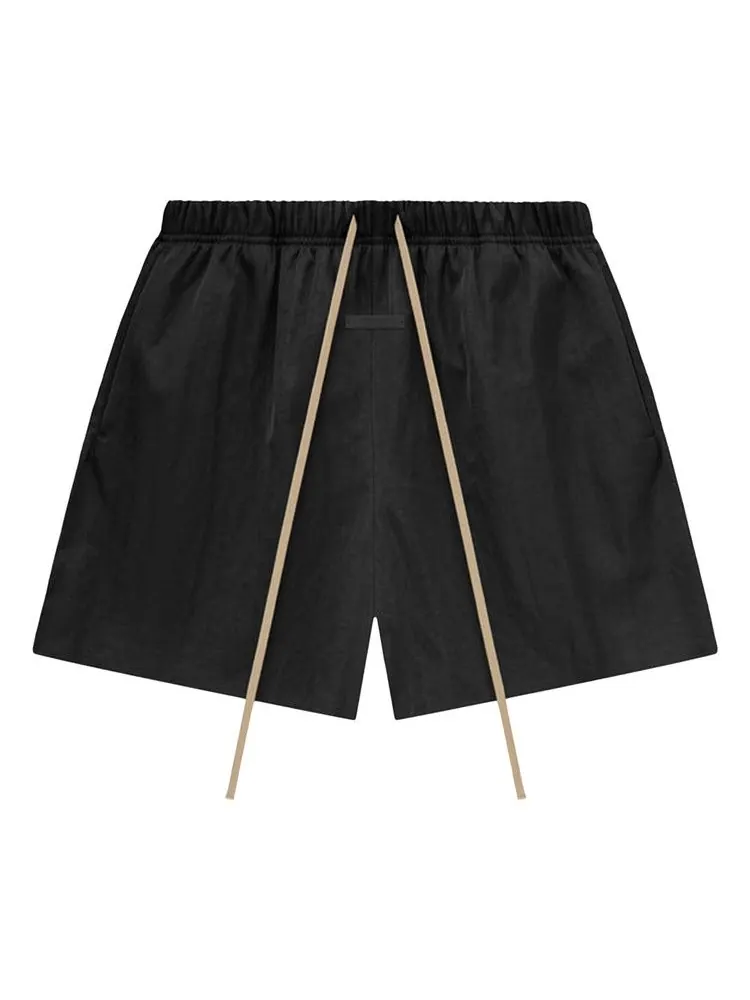 Шорты Fear of God Essentials Textured Nylon Soccer Short — изображение 1 из 2, черный