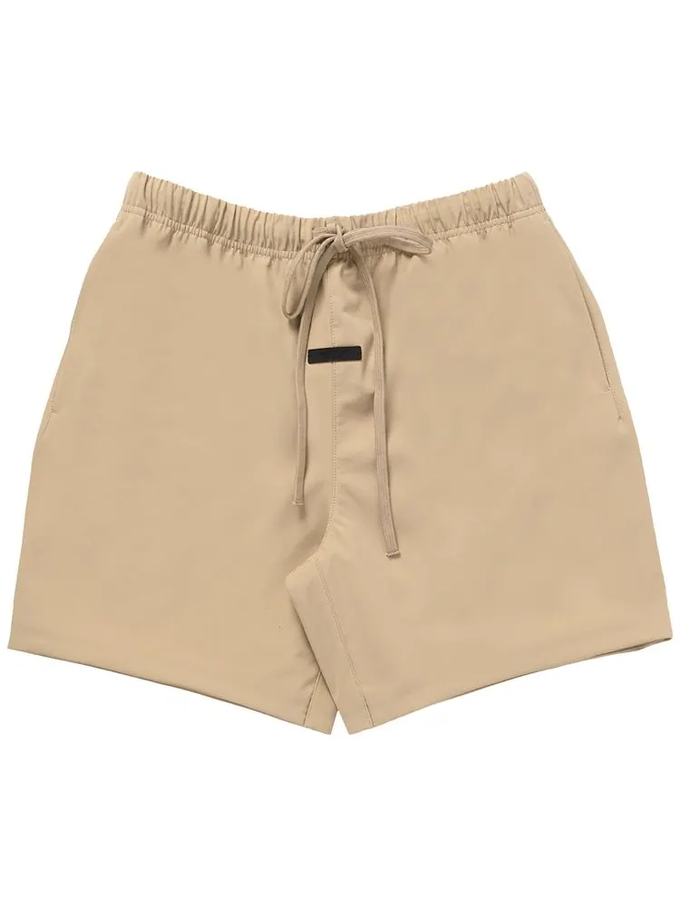 Шорты Fear of God Essentials Bonded Nylon Soccer Short 'Beige' — изображение 1 из 1, загар