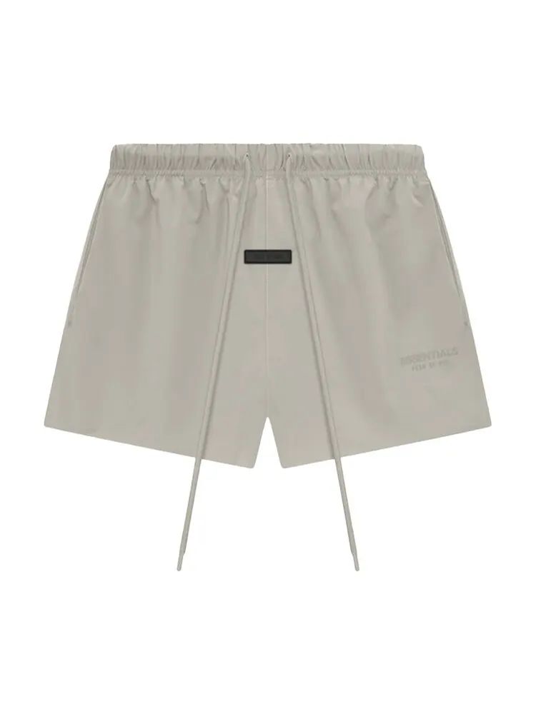 Шорты Fear Of God Essentials Fear of God Essentials Nylon Running Short — изображение 1 из 2, серый