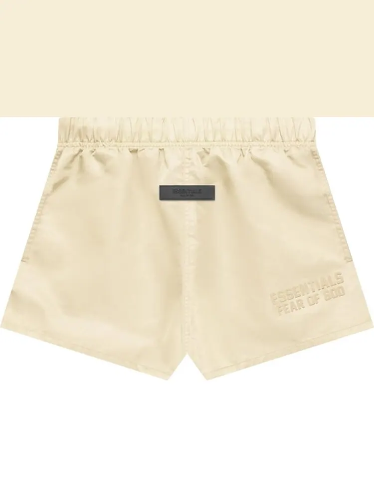 Шорты Fear of God Essentials Running Shorts 'Eggshell' — изображение 1 из 2, белый