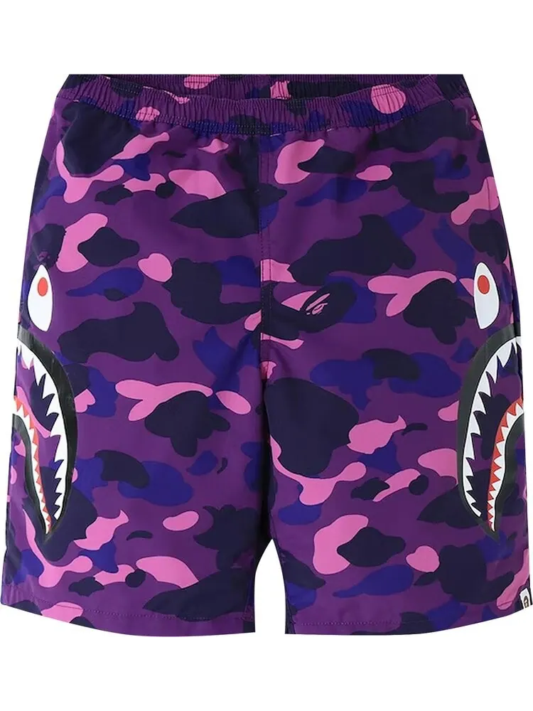 Шорты BAPE Color Camo Side Shark Beach Shorts 'Purple' — изображение 1 из 1, фиолетовый