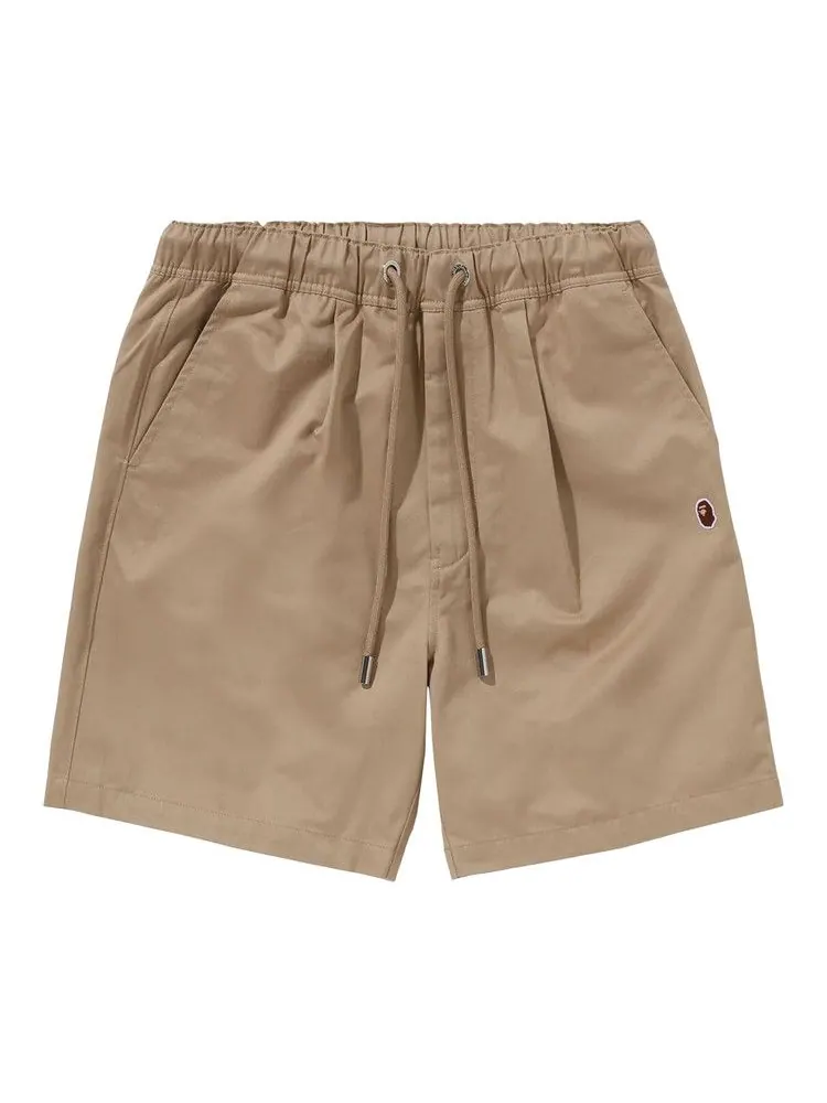 Шорты BAPE Ape Head One Point 2 Pleat Easy Chino Shorts — изображение 1 из 3, бежевый