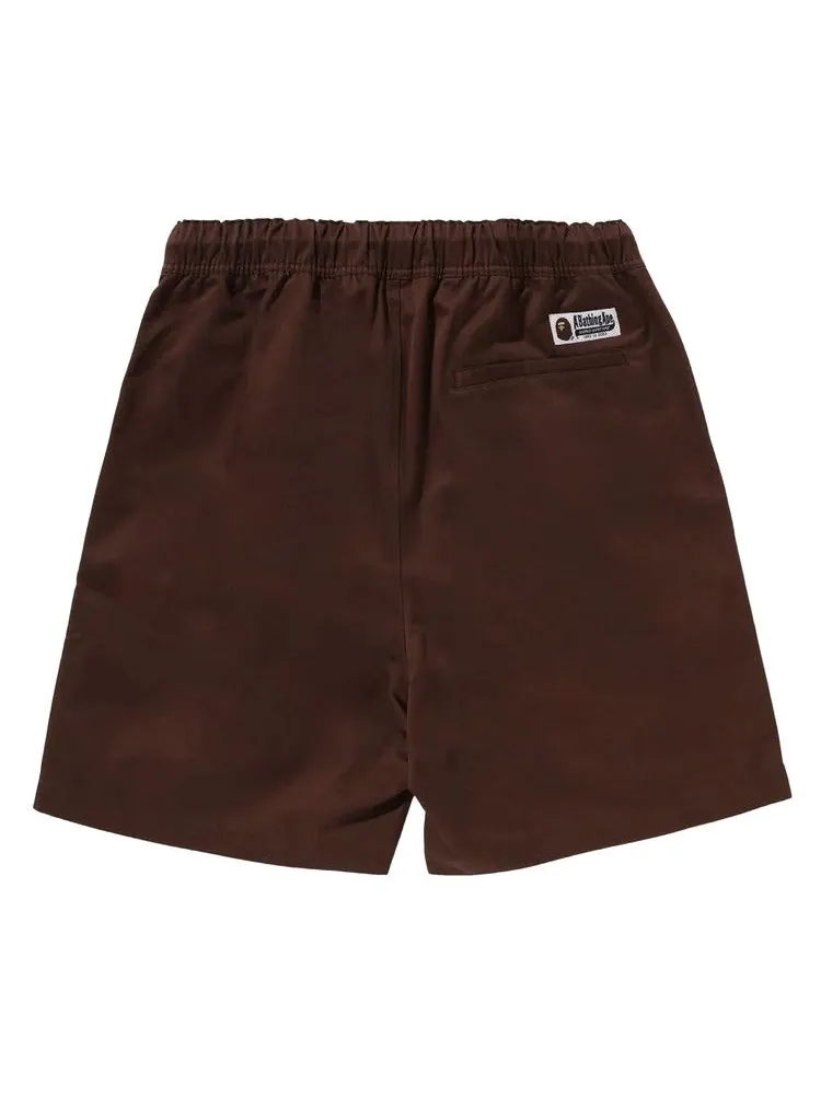 Шорты BAPE Ape Head One Point 2 Pleat Easy Chino Shorts — изображение 2 из 3, коричневый