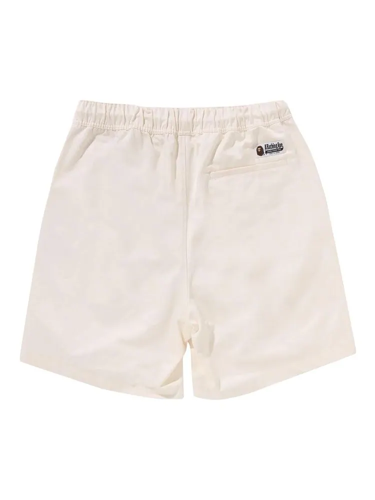Шорты BAPE Ape Head One Point 2 Pleat Easy Chino Shorts — изображение 2 из 3, белый