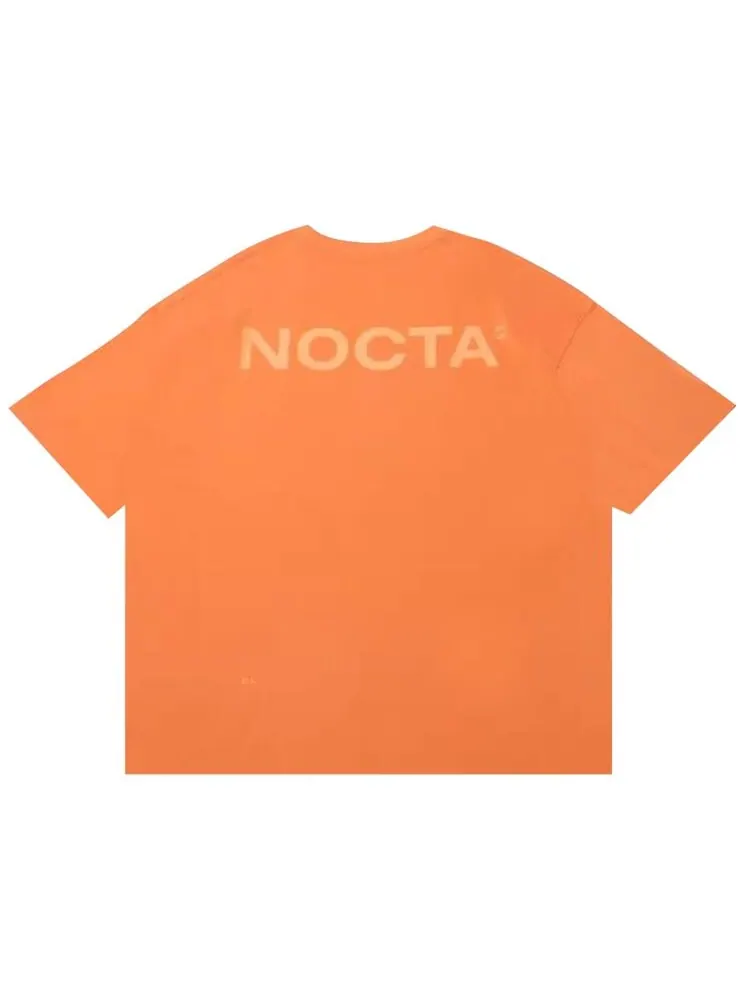 Футболка Nike x NOCTA Max90 T-Shirt (Asia Sizing) — изображение 2 из 2, оранжевый