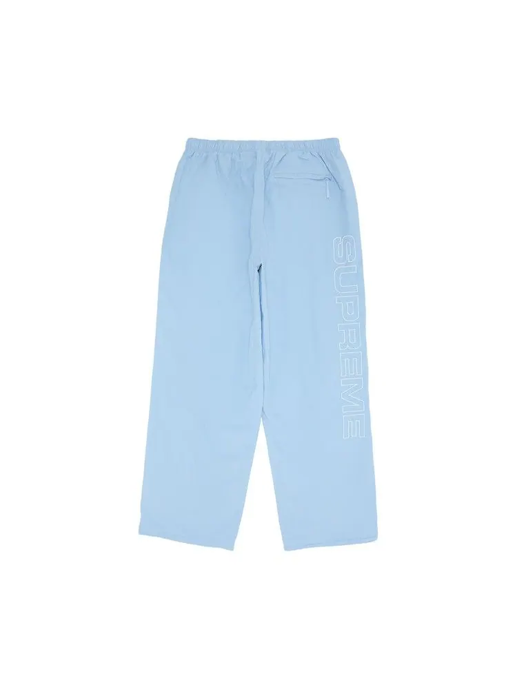Брюки Supreme Spellout Embroidered Ripstop Track Pant — изображение 2 из 3, светлый синий