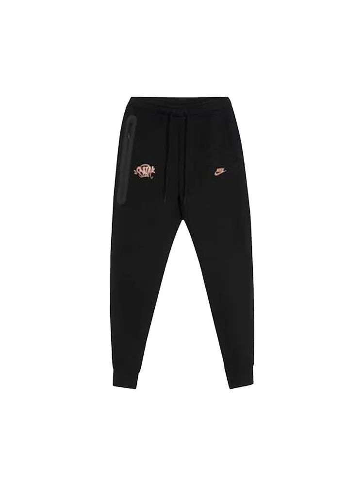 Джоггеры Nike Sportswear x Central Cee Tech Fleece Joggers — изображение 1 из 1, черный/металлик красный