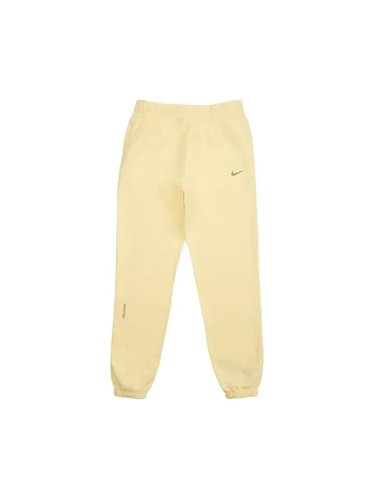 Спортивные штаны Nike NOCTA Fleece CS — изображение 1 из 2, желтый