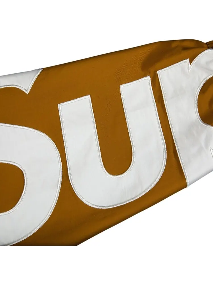 Куртка Supreme Spellout Track Jacket 'Dark Gold' — изображение 2 из 2, загар
