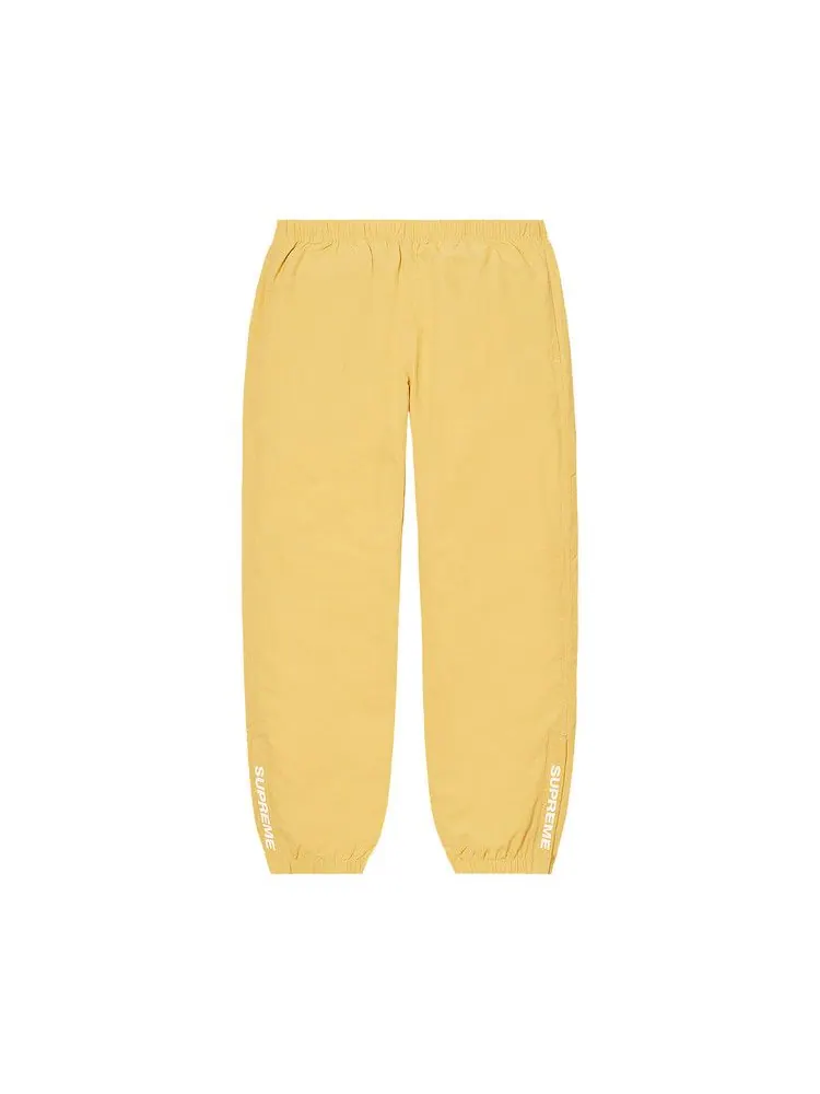 Брюки Supreme Warm Up Pant — изображение 1 из 3, бледный желтый