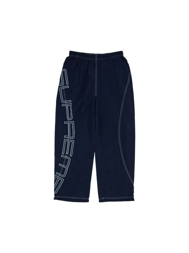 Брюки Supreme Spellout Embroidered Track Pant — изображение 1 из 3, темно-синий