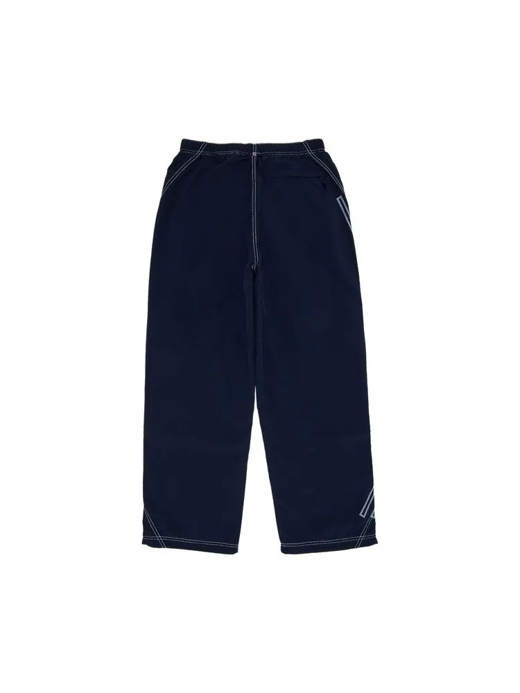 Брюки Supreme Spellout Embroidered Track Pant — изображение 2 из 3, темно-синий