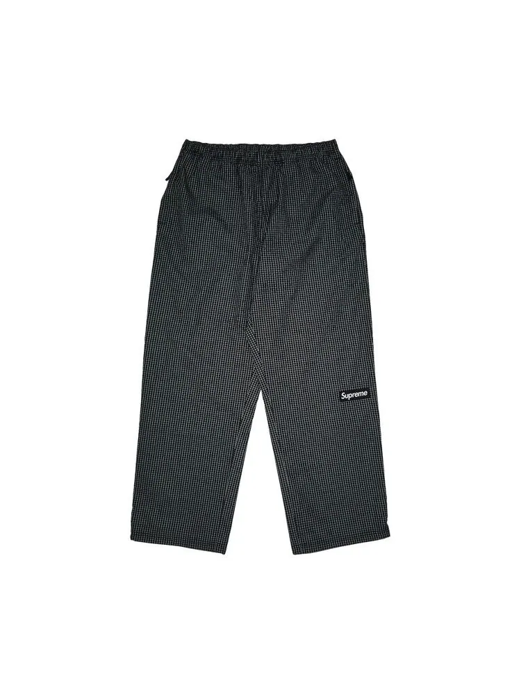 Брюки Supreme Reflective Ripstop Track Pant — изображение 1 из 3, черный