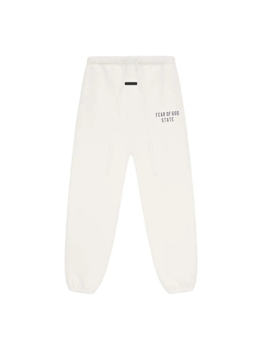 Спортивные брюки Fear of God Essentials Fleece Sweatpant 'Shell' — изображение 1 из 5, белый