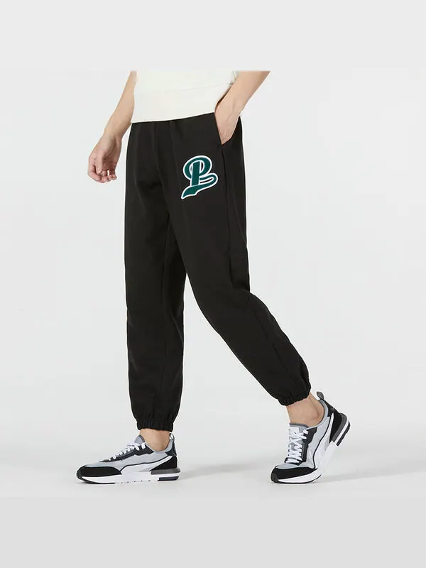 Брюки team sweatpants 'black green' Puma — изображение 3 из 4, черный/зеленый