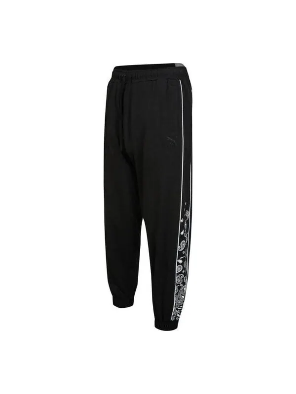 Брюки paisley sweat pants 'black' Puma — изображение 1 из 3, черный/белый