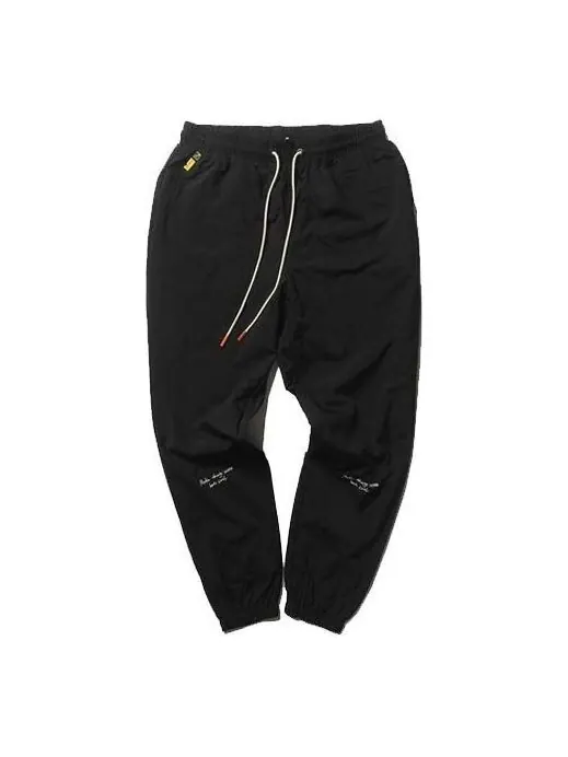 Брюки x randomevent woven pants 'black' Puma — изображение 1 из 4, черный