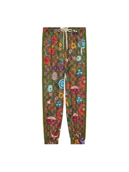 Брюки Gucci Flora GG Supreme Pattern Track Pants, с принтом — изображение 1 из 4, коричневый