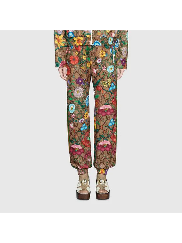 Брюки Gucci Flora GG Supreme Pattern Track Pants, с принтом — изображение 2 из 4, коричневый