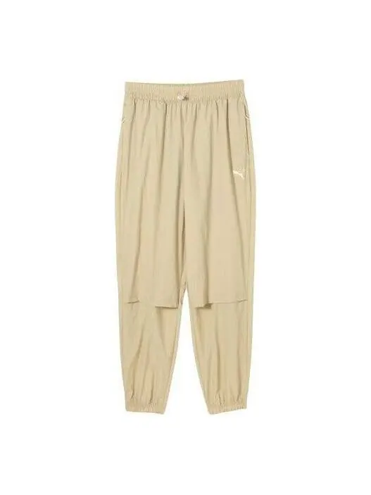 Брюки metropolitan rideruv logo pants 'beige' Puma — изображение 1 из 2, бежевый