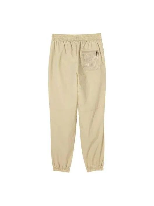 Брюки metropolitan rideruv logo pants 'beige' Puma — изображение 2 из 2, бежевый