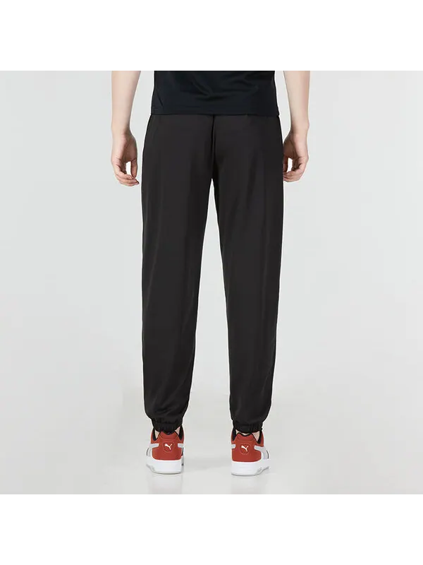 Брюки logo straight fit trackpants 'black' Puma — изображение 4 из 4, черный