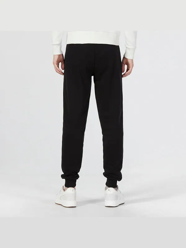 Брюки ess elevated sweatpants 'black' Puma — изображение 4 из 4, черный