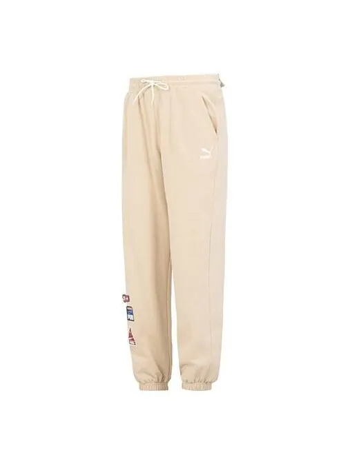Брюки team badge sweatpants 'beige' Puma — изображение 1 из 4, бежевый