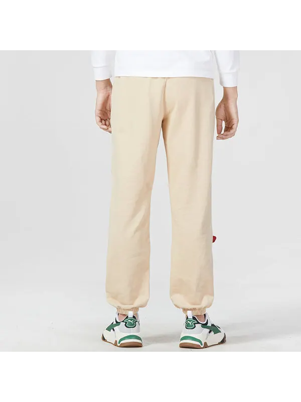 Брюки team badge sweatpants 'beige' Puma — изображение 4 из 4, бежевый
